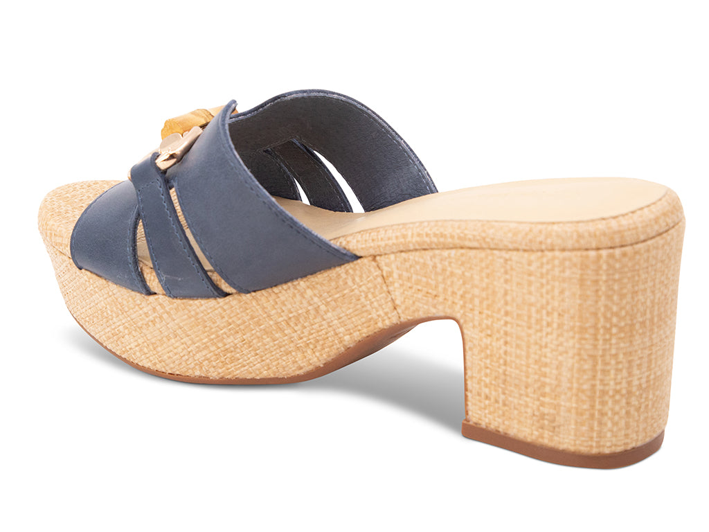 navy sandal with bamboo toggle buckle on a raffia wrapped platform and block heel - view from the back angle