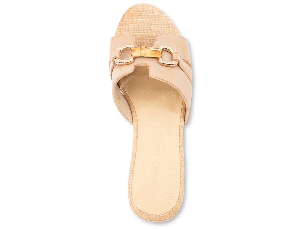 sand colored sandal with bamboo toggle buckle on a raffia wrapped platform and block heel - top view