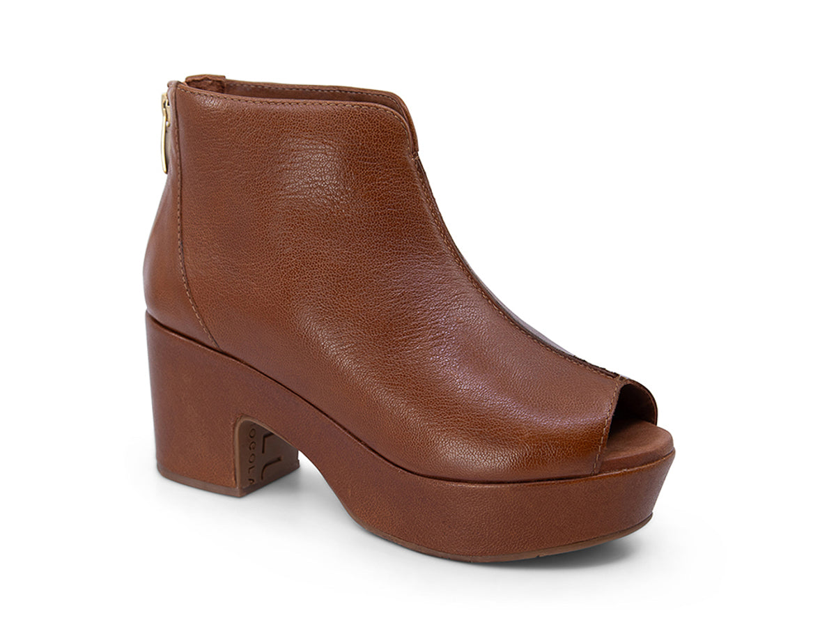 Brown leather peep toe ankle boot with platform sole and bakc zipper on a white background side angle view
