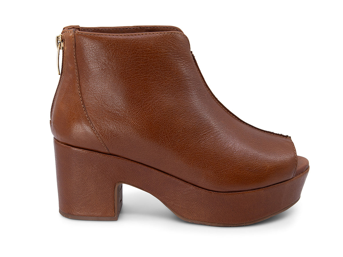 Brown leather peep toe ankle boot with platform sole and bakc zipper on a white background side view