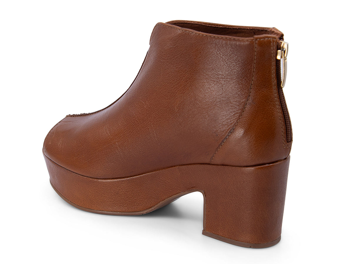 Brown leather peep toe ankle boot with platform sole and bakc zipper on a white background side angle view