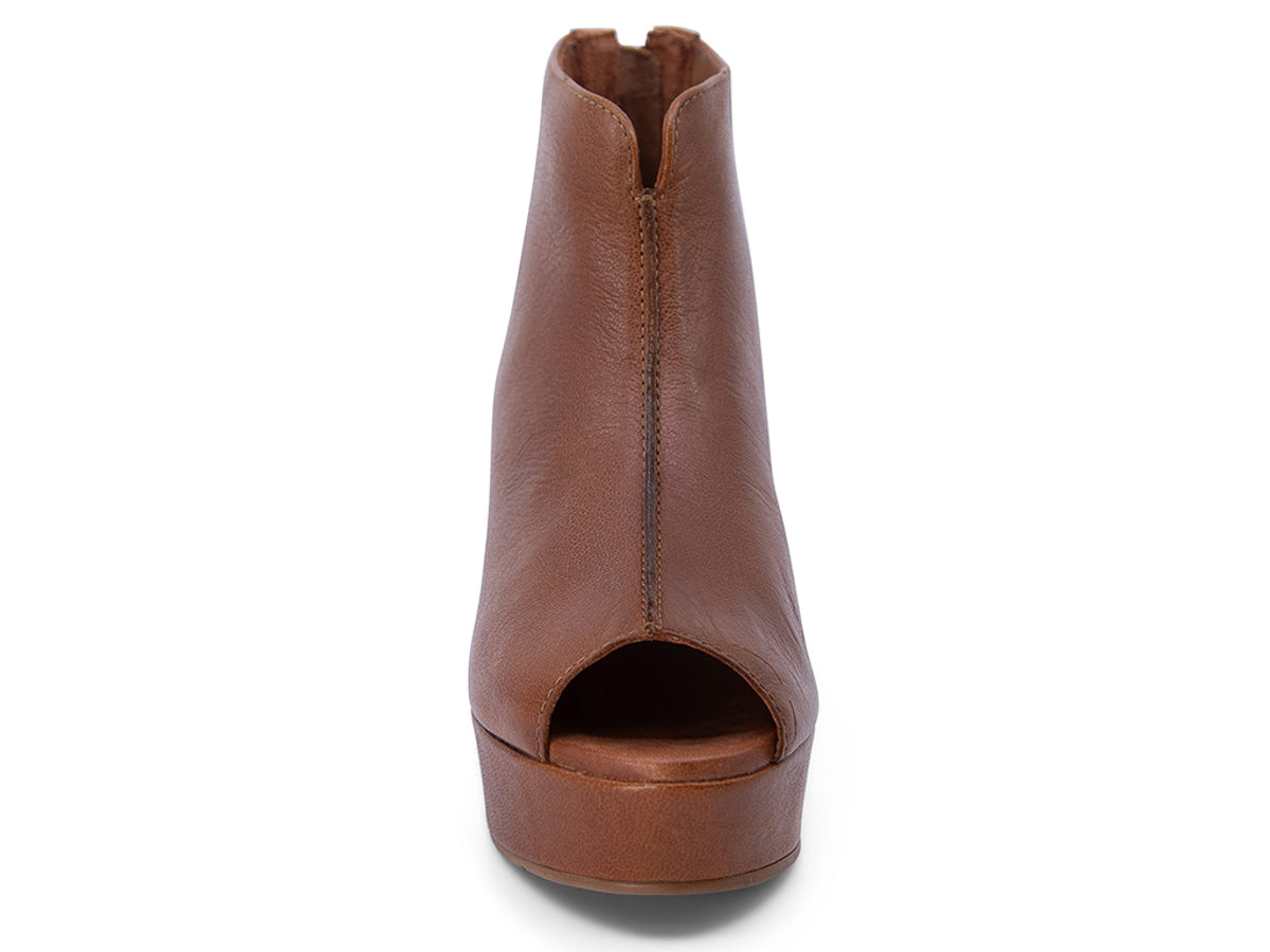 Brown leather peep toe ankle boot with platform sole and bakc zipper on a white background front view