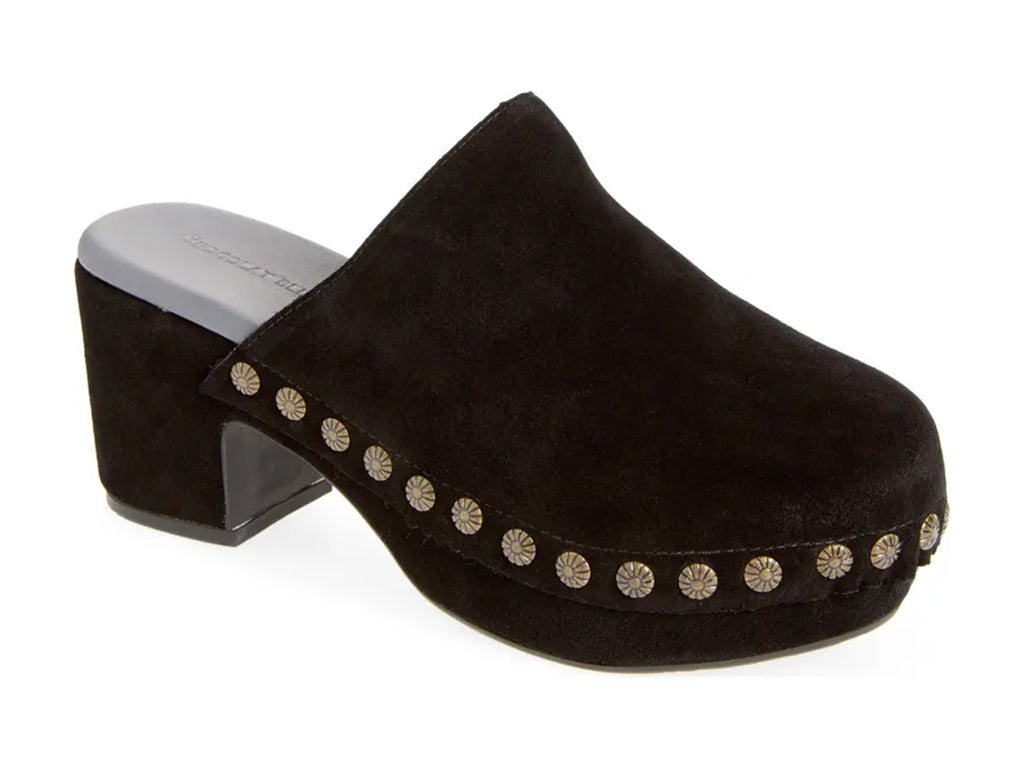 black suede clogs on a chunky platform with decorative metallic flower-shaped studs along the side - 3/4 front view