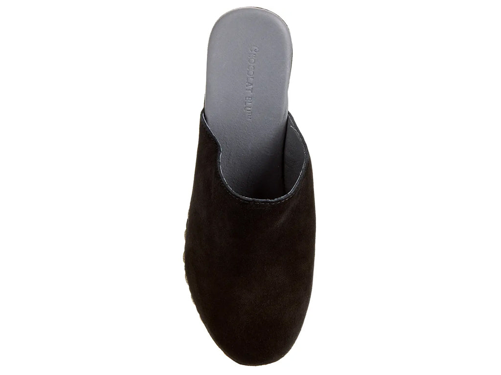 black suede clogs on a chunky platform with decorative metallic flower-shaped studs along the side - top view