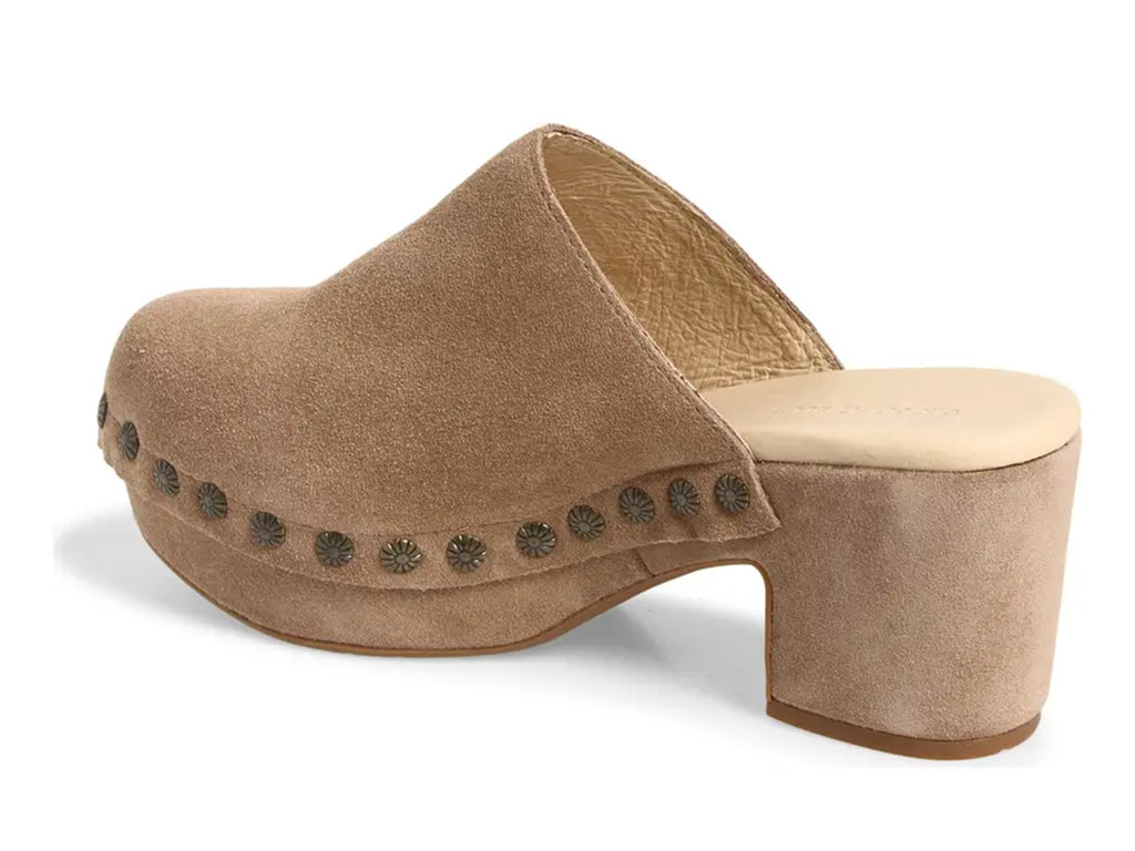latte suede clogs on a chunky platform with decorative metallic flower-shaped studs along the side - inner side view