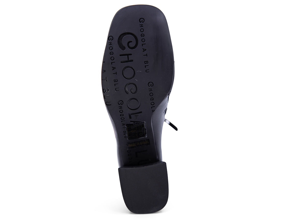 Black leather ankle boot with a block heel on a white background sbottom sole view