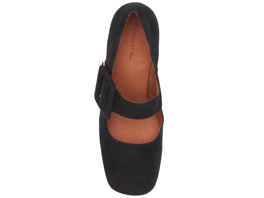Black suede shoe with block heel and decorative buckle on strap kaying over instep on a white background top view