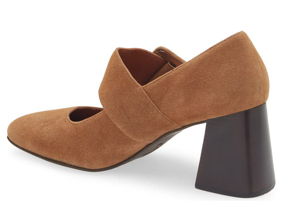 Tobacco suede shoe with block heel and decorative buckle on strap kaying over instep on a white background side angle view