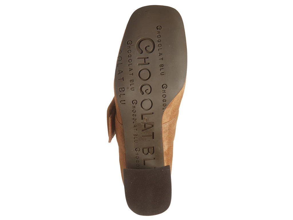 Tobacco suede shoe with block heel and decorative buckle on strap kaying over instep on a white background bottom sole view