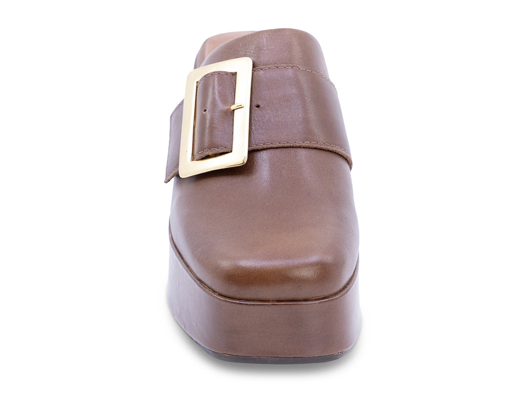 A brown leather platform clog shoe with a chunky block heel and a large gold-tone rectangular buckle - front view