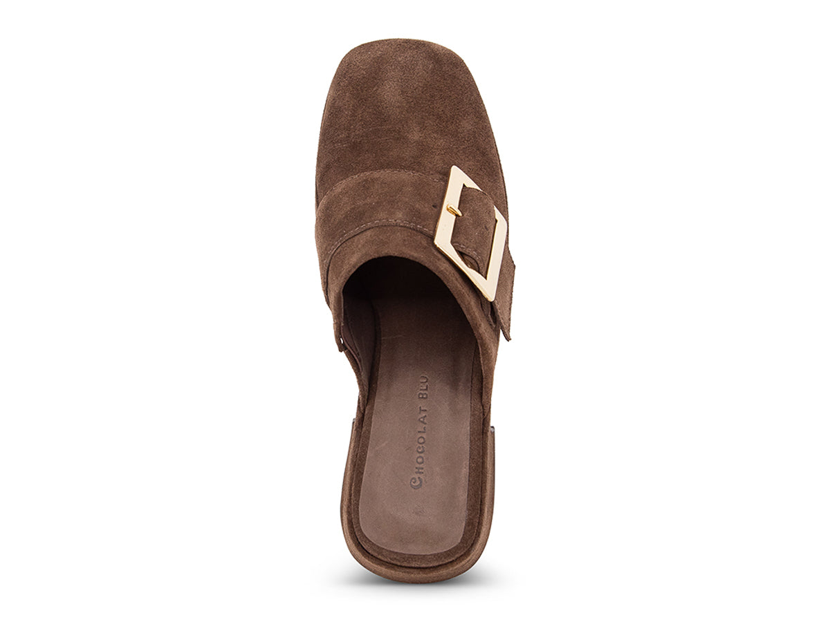 Brown suede platform slide in block heeled clog with gold buckle on a white background top view