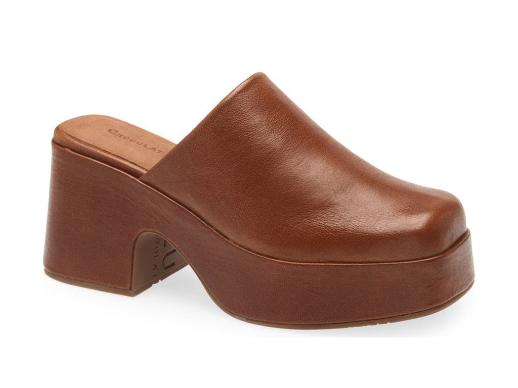 Brown leather platform clog slide in shoe on a white background side angle view