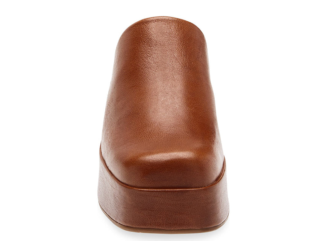 Brown leather platform clog slide in shoe on a white background front view