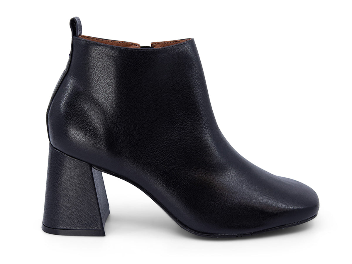 Black leather ankle boot with a block heel on a white background side view