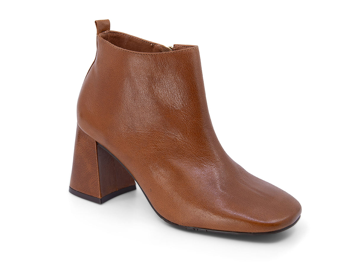 Brown leather ankle boot with a block heel on a white background side angle view