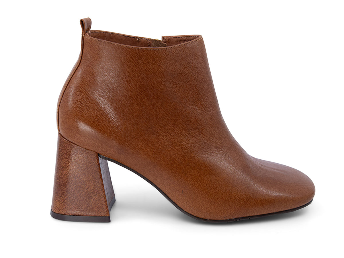 Brown leather ankle boot with a block heel on a white background side view