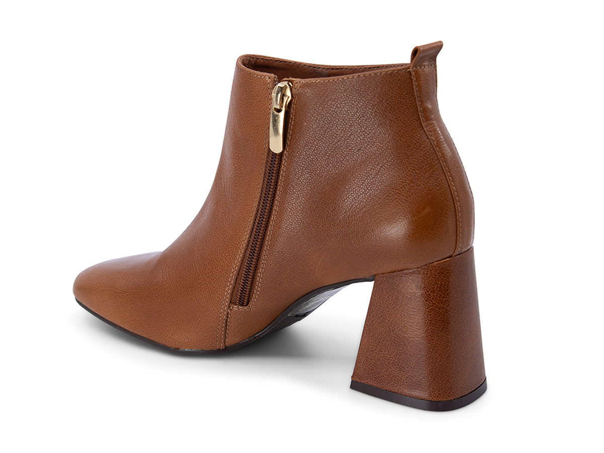Brown leather ankle boot with a block heel on a white background side angle view