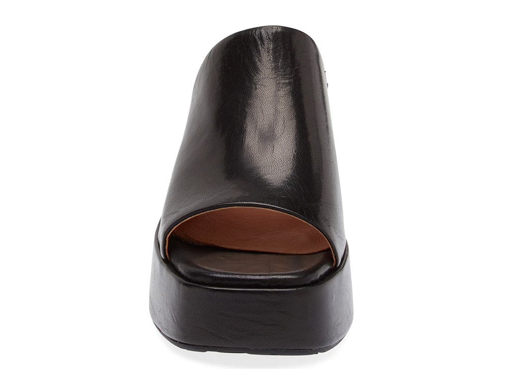 Black chunky heeled open toed platform mule with a leather upper on a white background front view
