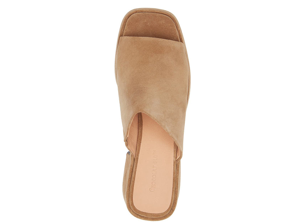 Tan chunky heeled open toed platform mule with a suede upper on a white background top view