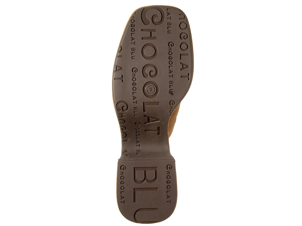 Tan chunky heeled open toed platform mule with a suede upper on a white background bottom sole view