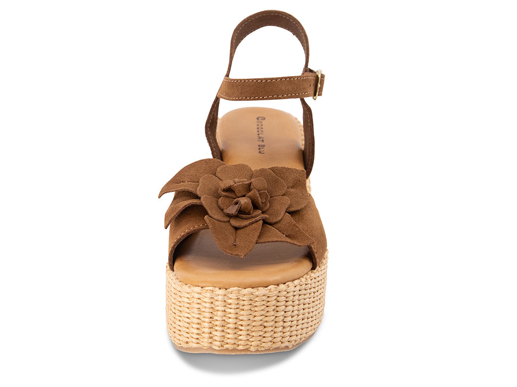 Brown wedge sandal with a flower detail and an ankle strap - view of the front of the shoe