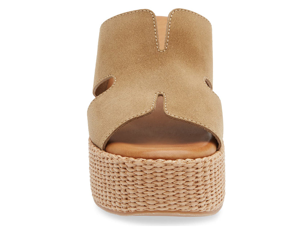 Taupe sandal with woven sole on a white background