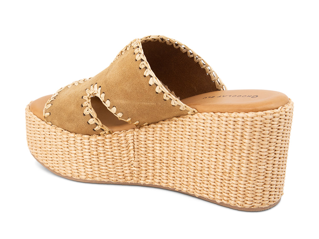 camel suede slide sandal on a raffia wrapped wedge - view from the back