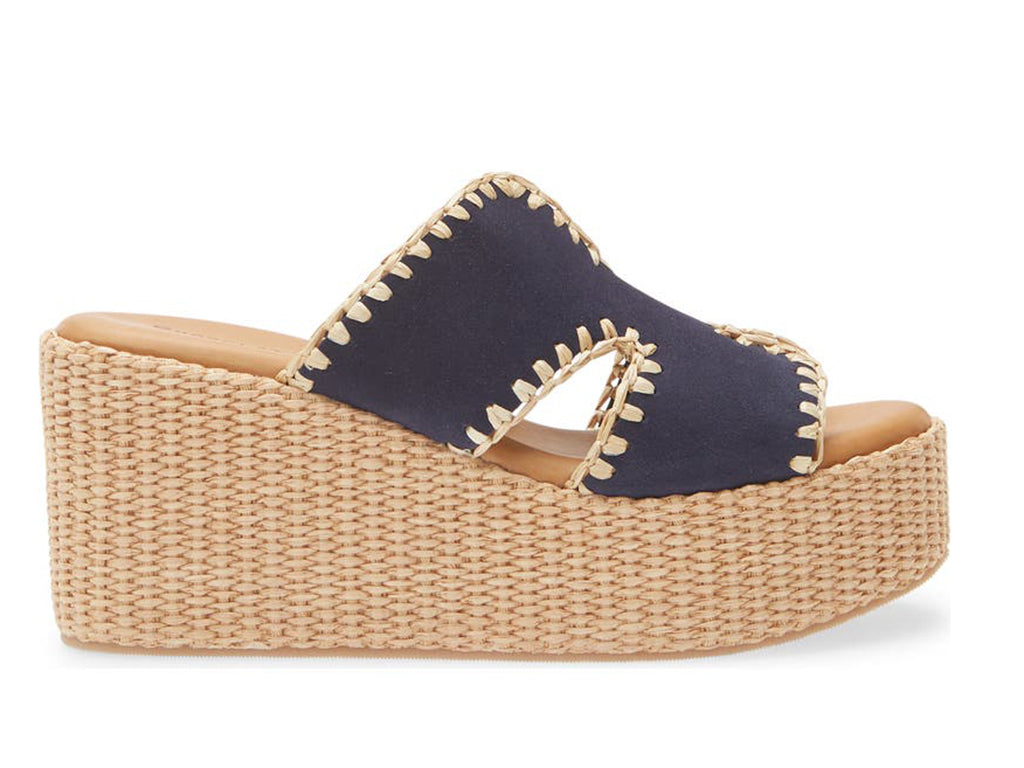 navy suede slide sandal on a raffia wrapped wedge-side