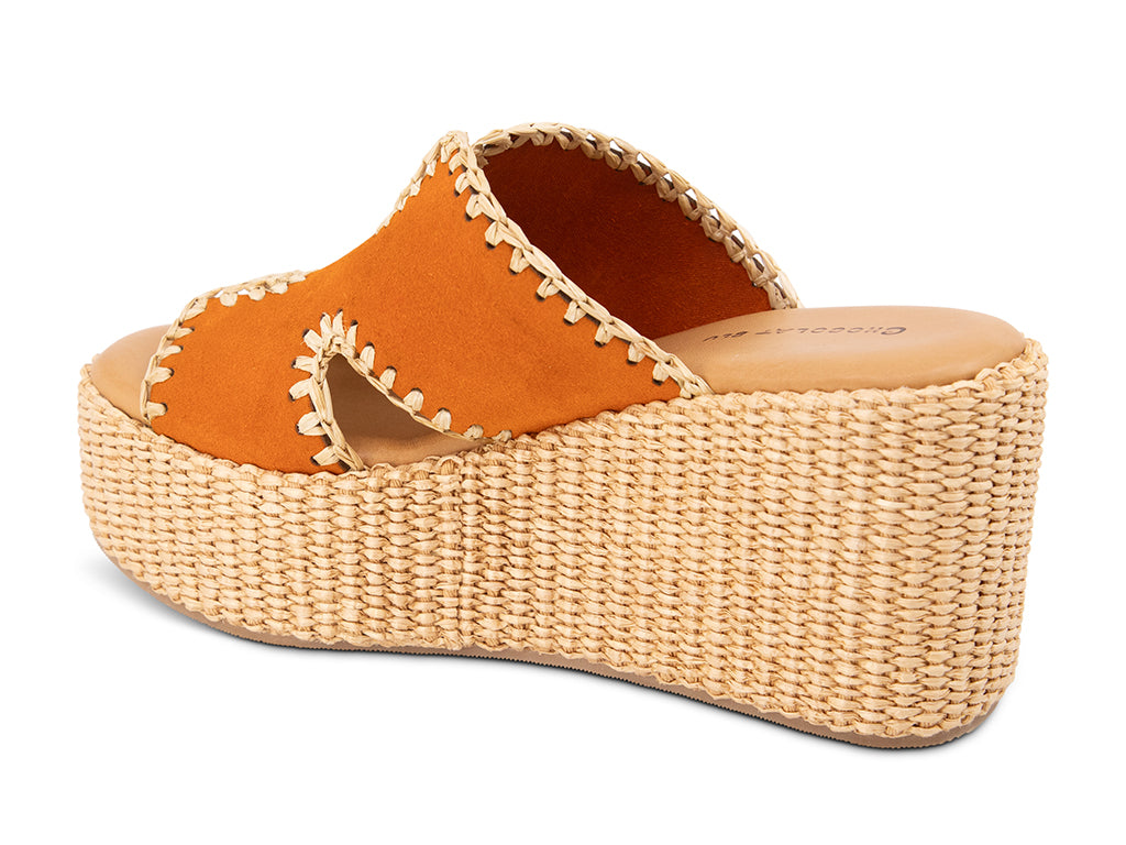 orange suede slide sandal on a raffia wrapped wedge - view from the back