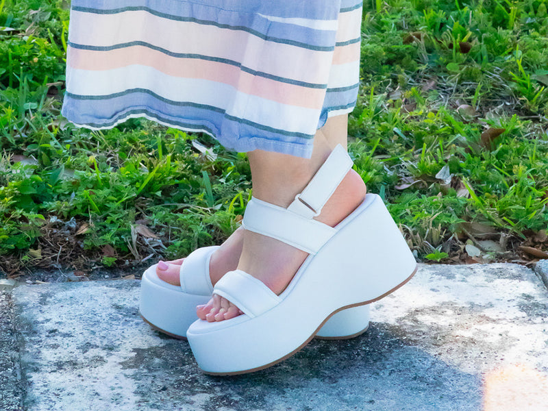 kande white sandal on a model
