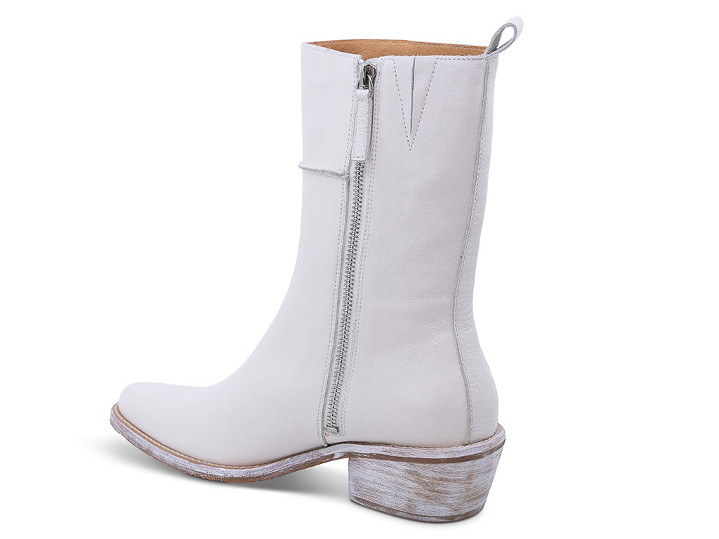off white leather ankle boot with a low stacked block heel and a pull tab at the top - medial view of the side and a zipper