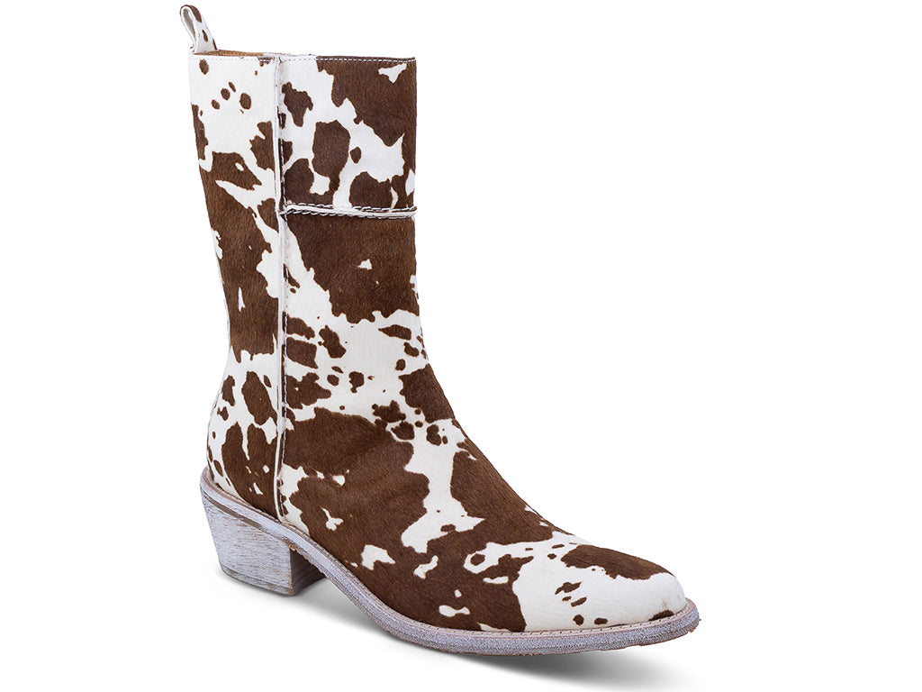 brown and white patterned calf hair ankle boot with a low block heel and a pull tab at the top - front 3/4 view