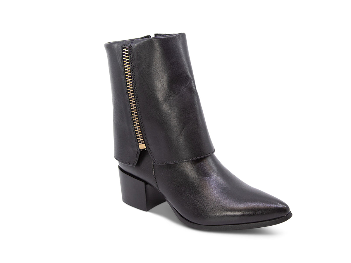 Black leather boot with a gold side zipper and overlap design on a white background side angle view