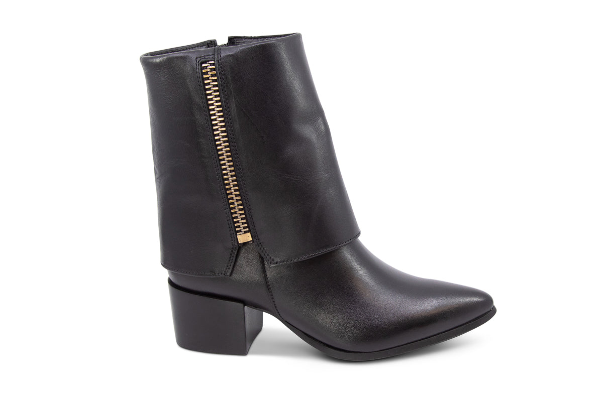 Black leather boot with a gold side zipper and overlap design on a white background side view