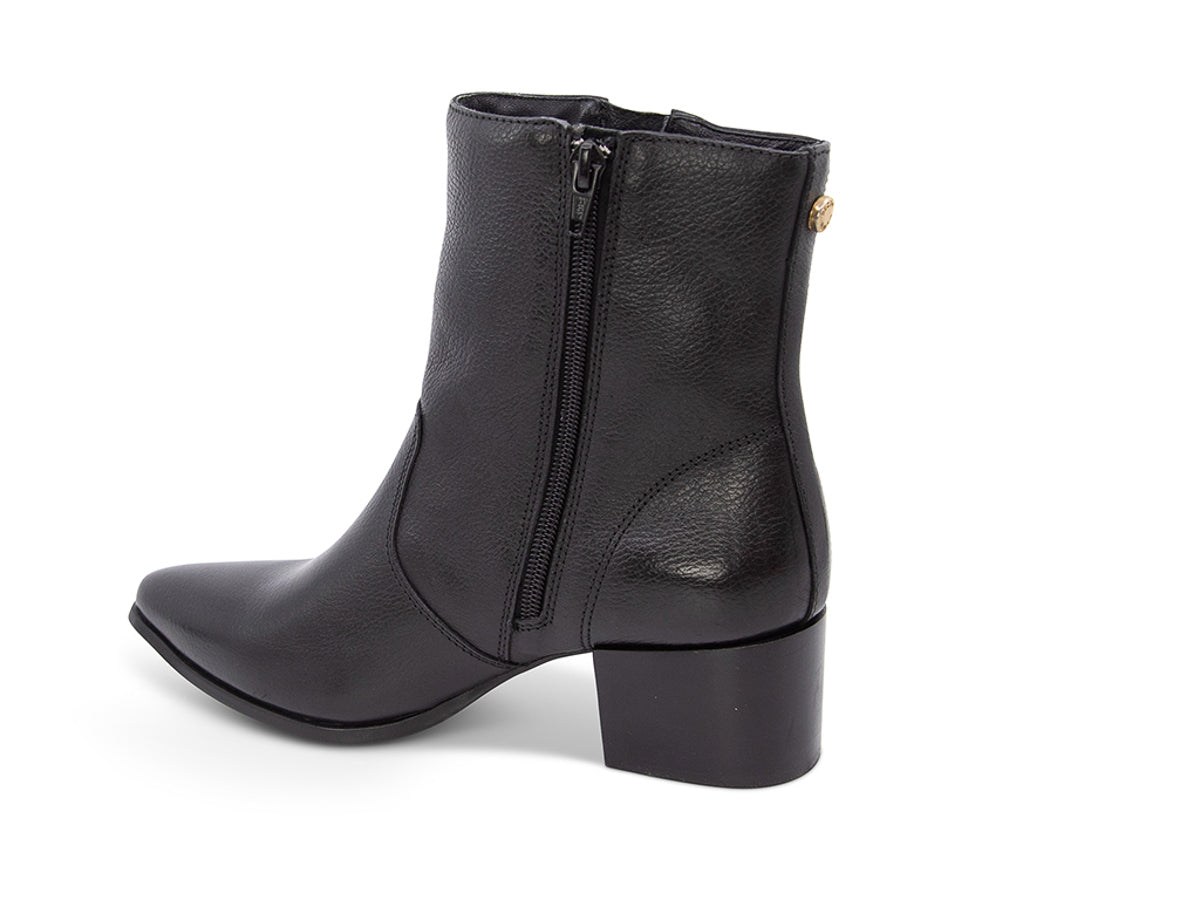 Black ankle boot with gold zipper on a white background side angle view