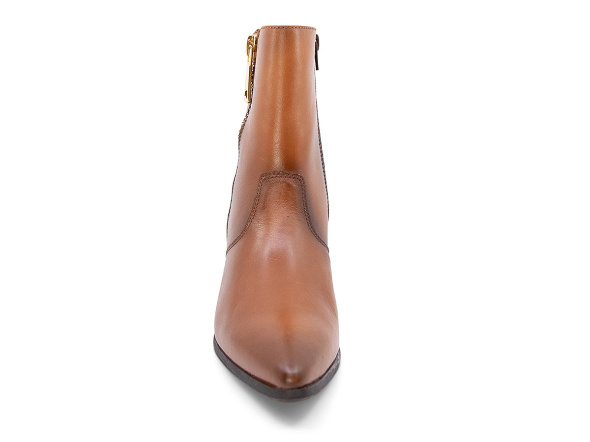 Brown ankle boot with gold zipper on a white background fron view