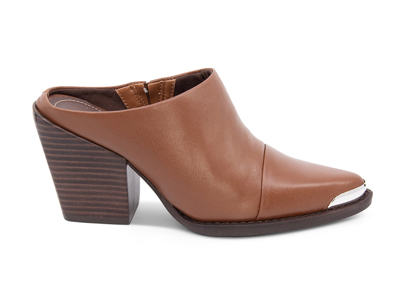 Brown leather slide in shoe with a block heel and metal toe design  on a white background side view