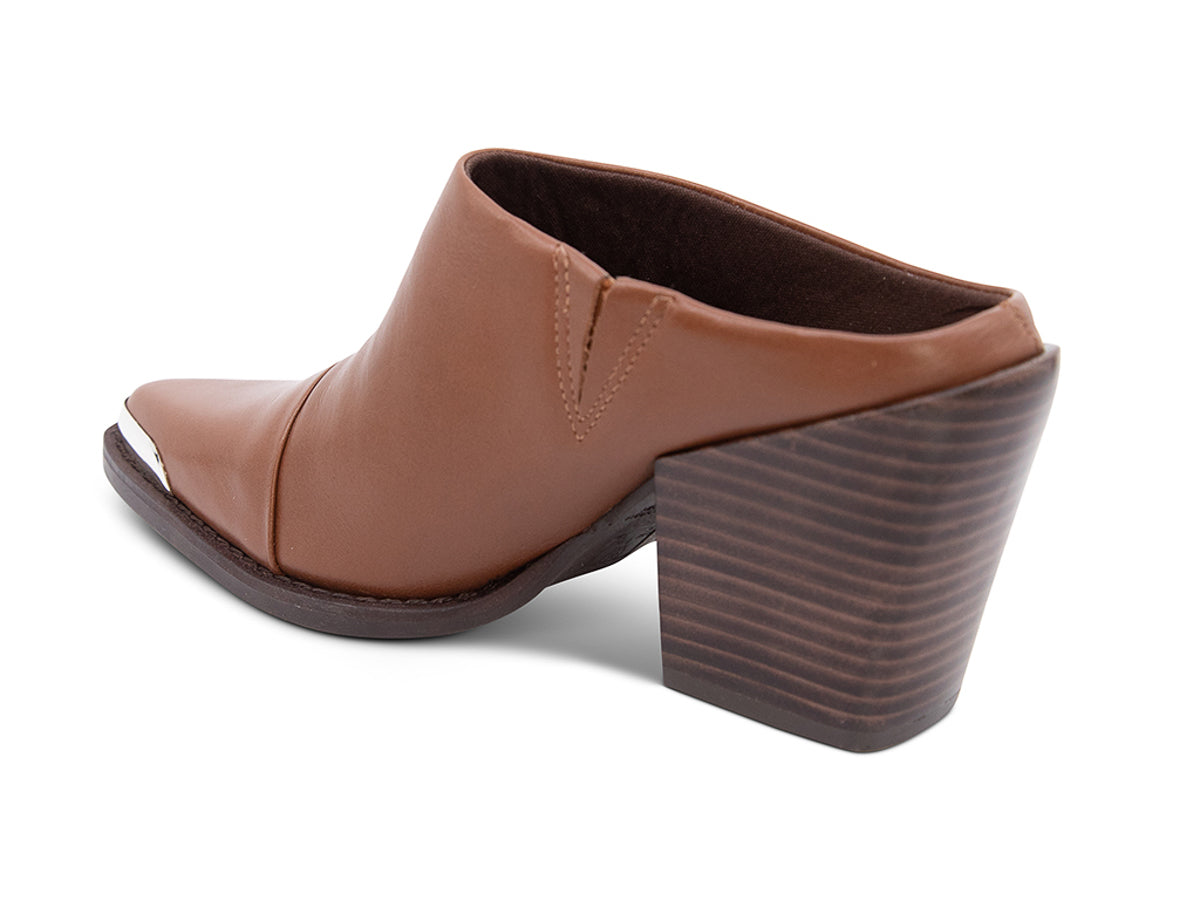 Brown leather slide in shoe with a block heel and metal toe design  on a white background side angle view
