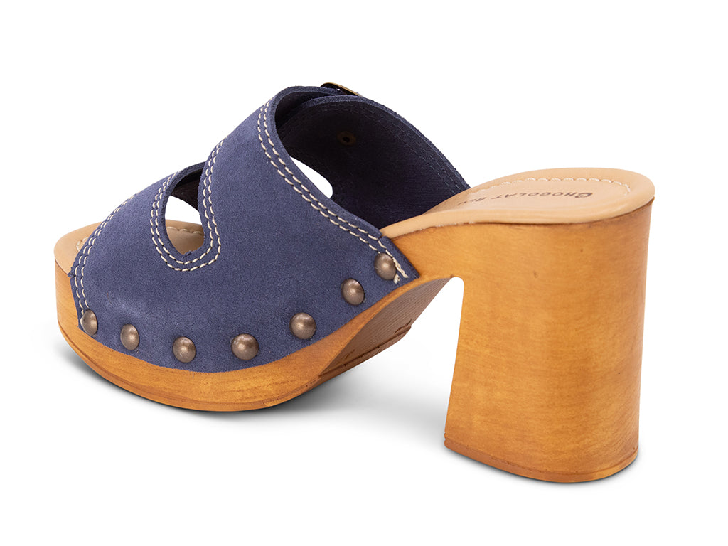 jeans suede slide sandal on wooden platform -view from the back