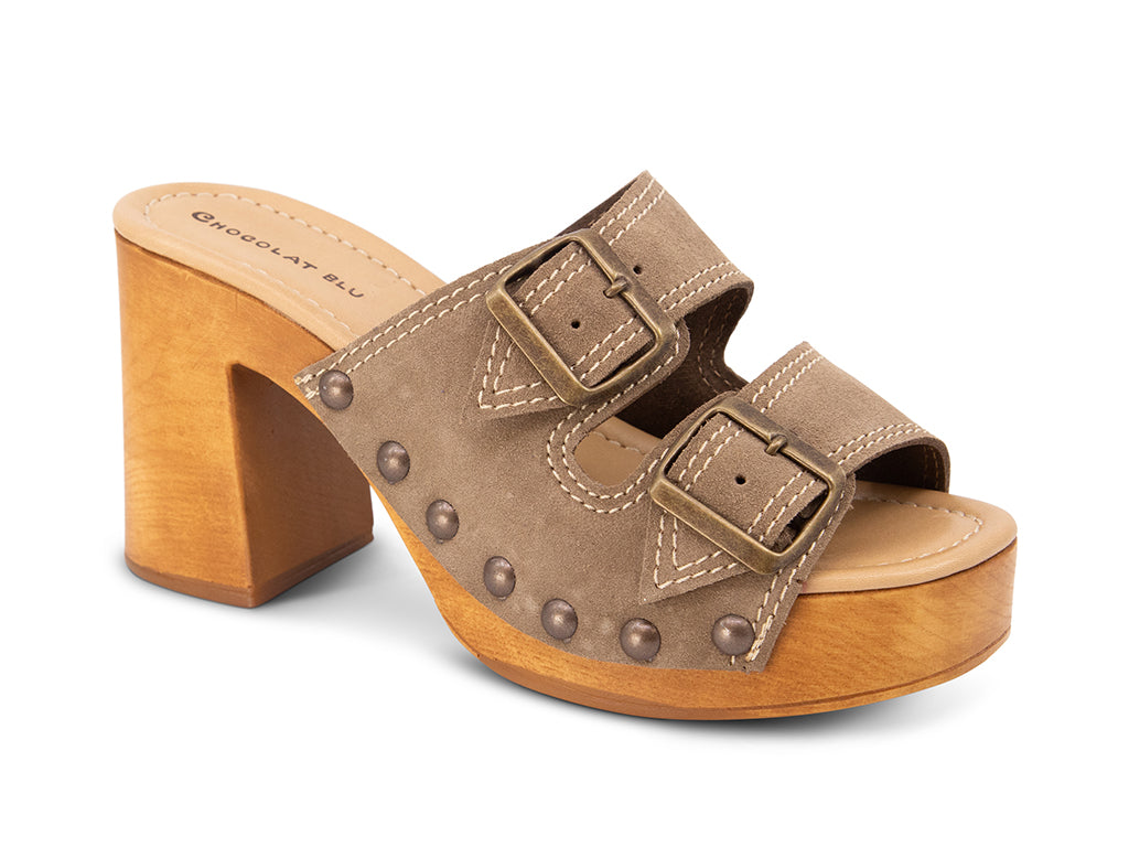 taupe suede slide sandal on wooden platform 