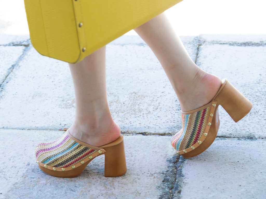 melody high heel slide in multi raffia on a model