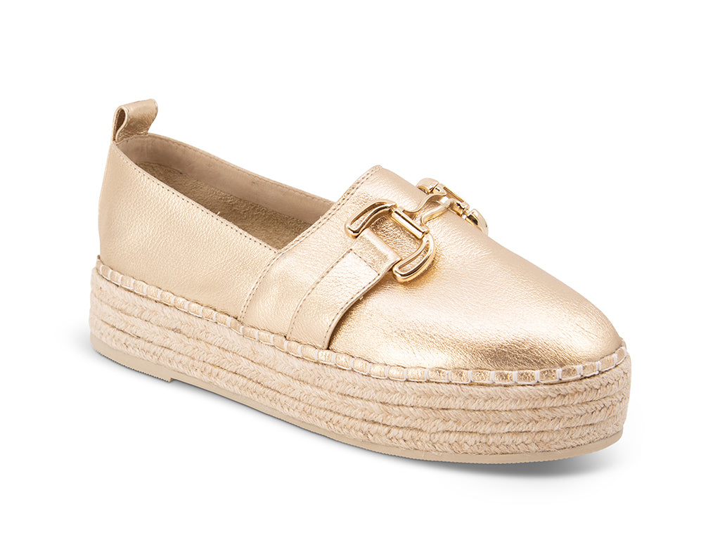 gold espadrille flat shoe with a gold buckle