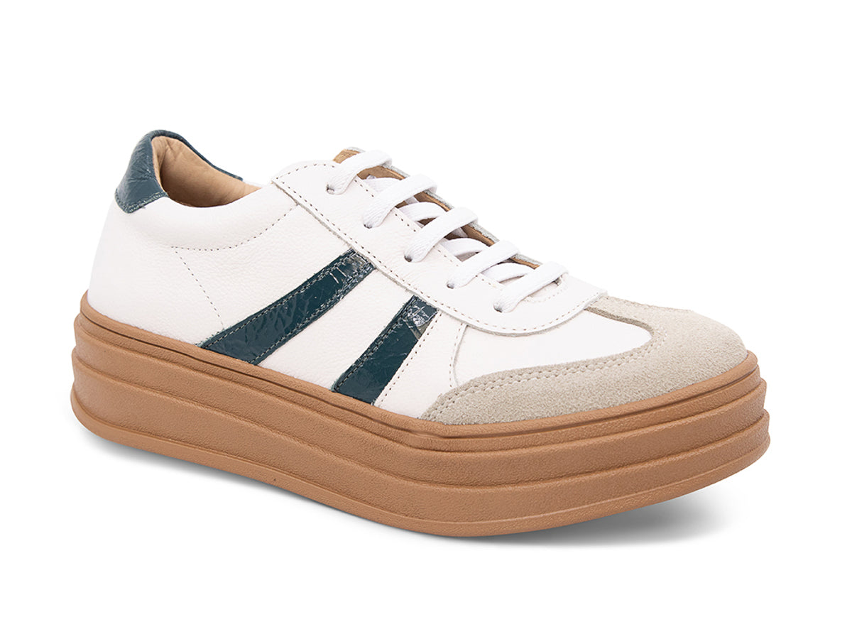 White lace up sneaker with a brown sole and green  stripe on a white background side angle view