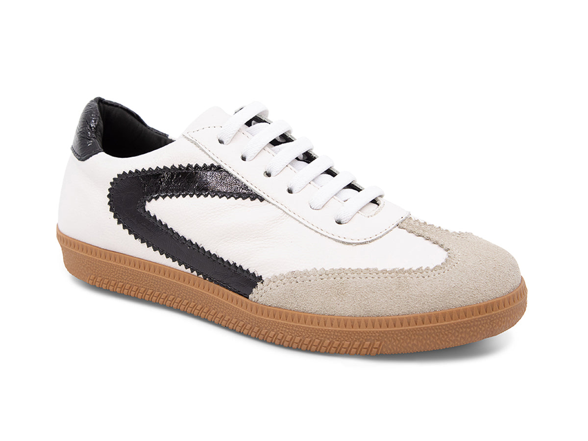 White sneaker with brown sole and black decorative design on a white background side angle view