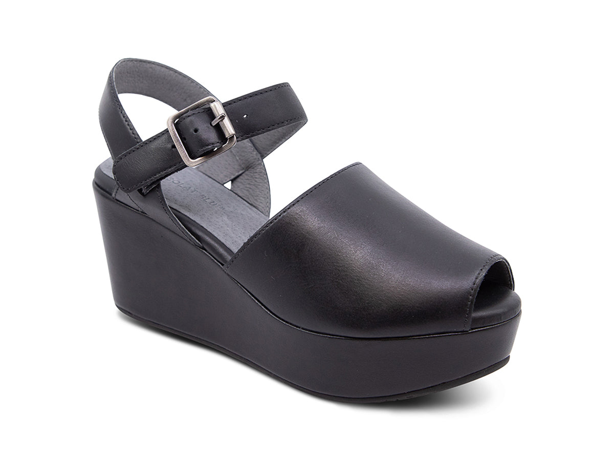 Black leather wedge peep toe platform sandal with a buckle ankle strap on a white background side angle view