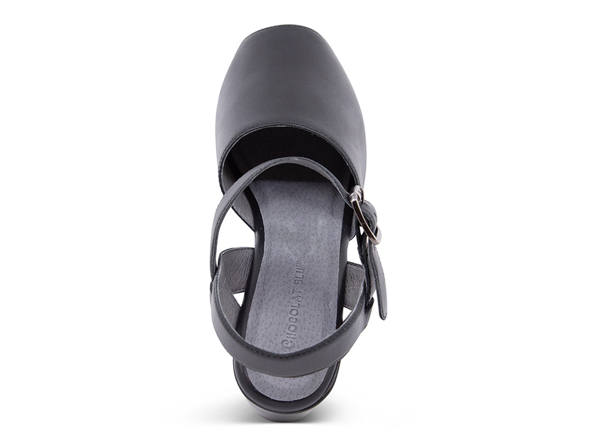Black leather wedge peep toe platform sandal with a buckle ankle strap on a white background top view