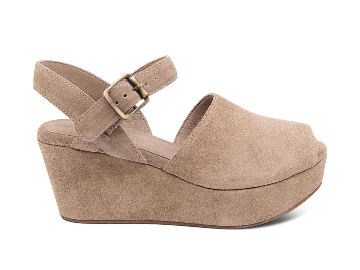 Taupe suede wedge peep toe platform sandal with a buckle ankle strap on a white background side view