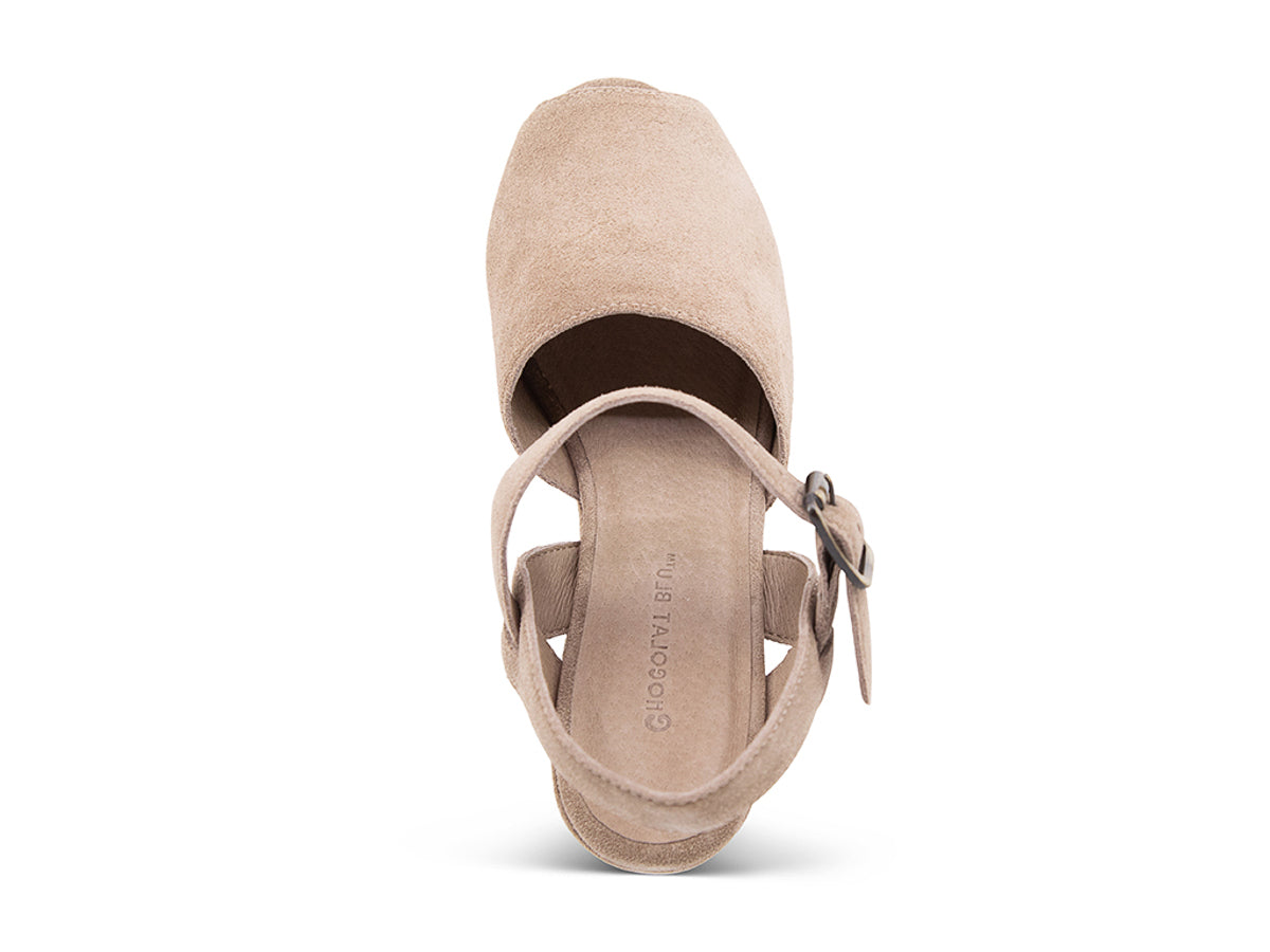 Taupe suede wedge peep toe platform sandal with a buckle ankle strap on a white background top view