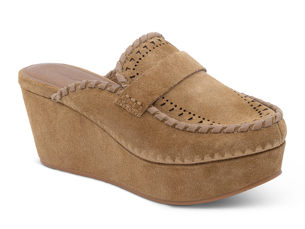 A camel suede wedge mule with decorative hand-stitched detailing and perforation - front 3/4 view