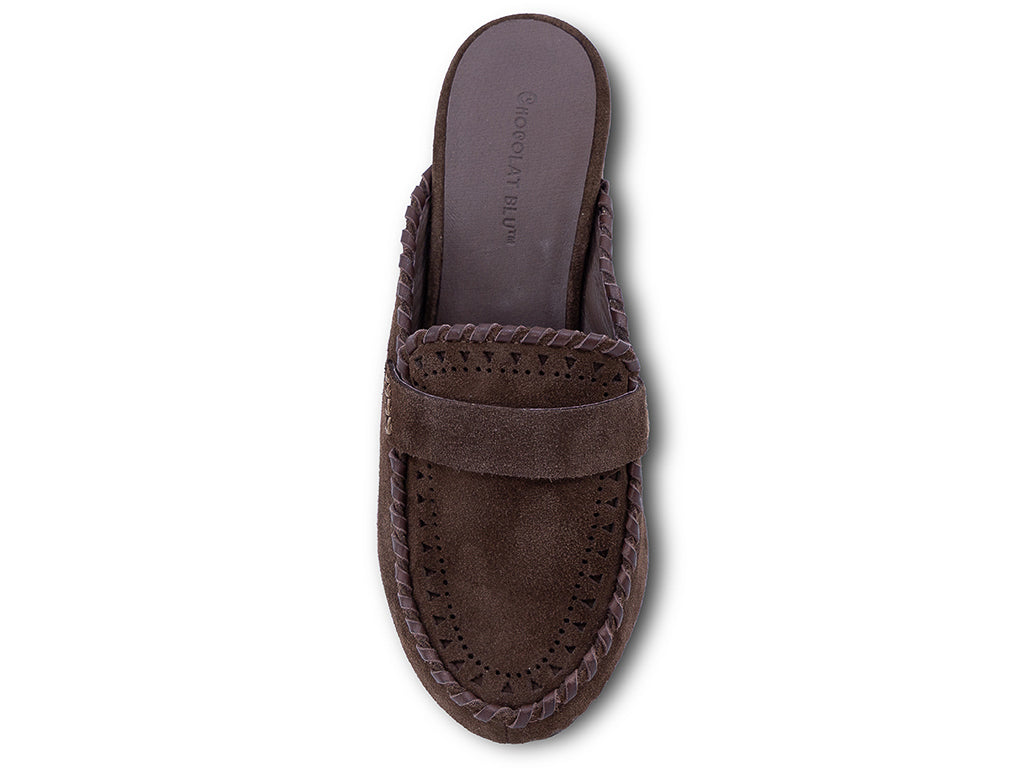 A chocolate suede wedge mule with decorative hand-stitched detailing and perforation - top view